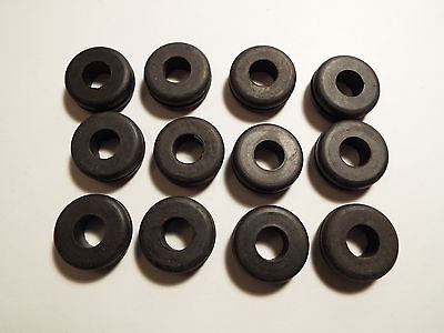 #ad 12 RUBBER GROMMETS.FITS 5 8 PANEL HOLE WITH 3 8 INNER HOLE. $6.89
