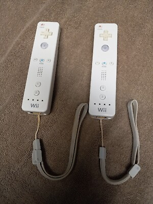 #ad 2x Original Wii Controllers White With Wrist Straps $23.00