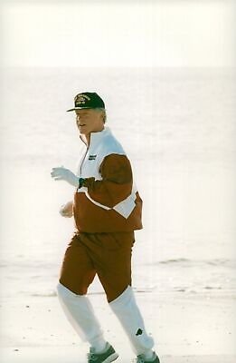 #ad Bill Clinton takes a springtur on the beach Vintage Photograph 671546 $13.90