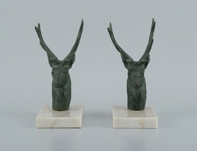#ad A pair of French Art Deco bookends. Stags in patinated metal on a marble base. $590.00