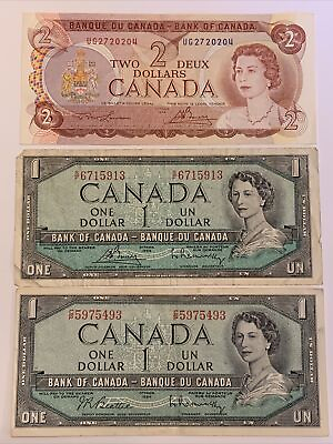 #ad 1954 $1 amp; 1974 $2 Canada Banknotes. Young Queen. 3 notes $29.75
