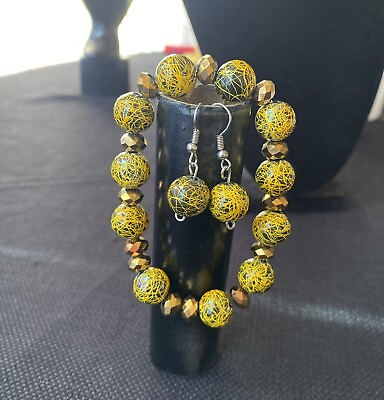 #ad Unique yellow and black bracelet earring combo $12.00