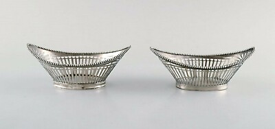 #ad European silversmith. A pair of silver bowls with reticulated decoration. $340.00