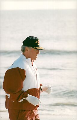#ad Bill Clinton takes a springtur on the beach Vintage Photograph 671564 $14.90